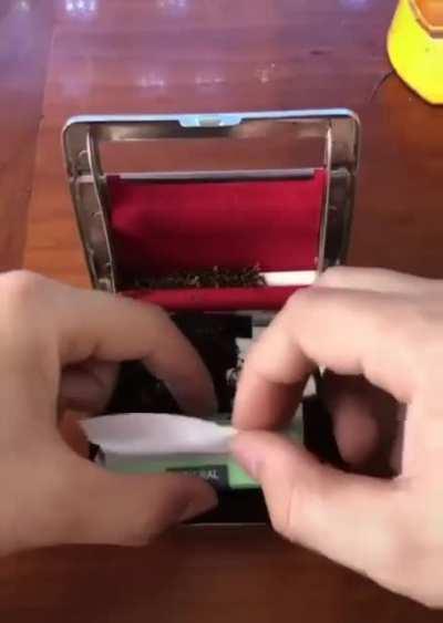 A cigarette rolling case
