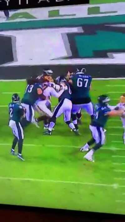 How do the refs, Al Michaels, and Cris Hollingsworth not notice the mugging of Tim Settle on this fourth down play?