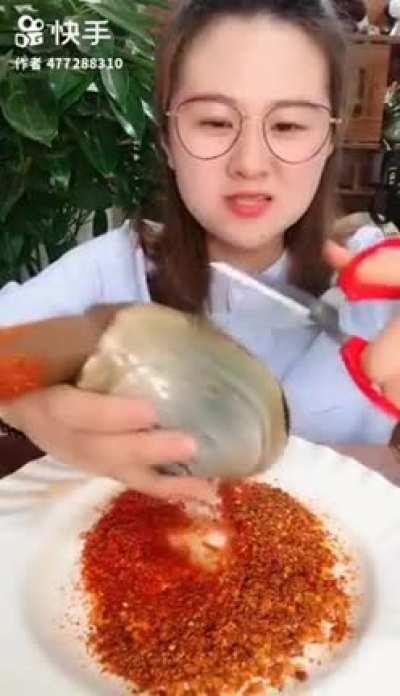 Good morning friends please enjoy this video of a girl eating a geoduck