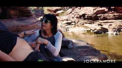 Sneaking it inside her mouth.