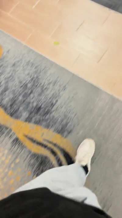 Grey sweatpants in the hotel lobby 