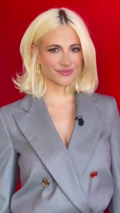 Showing off her look in Grey