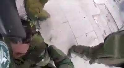 Riot cop hit with molotov