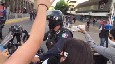 Mexican Cop set on fire
