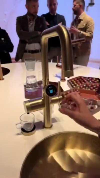 A faucet from which coffee flows, finally