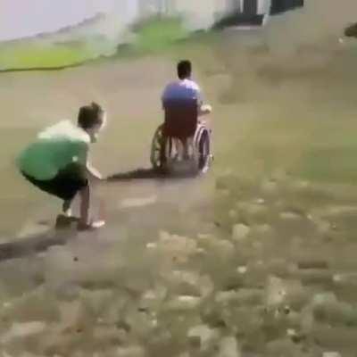 wcgw rolling down a hill on a wheel chair (volume warning?)