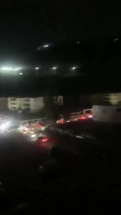 Civilian personnel leaving Fort Tiuna