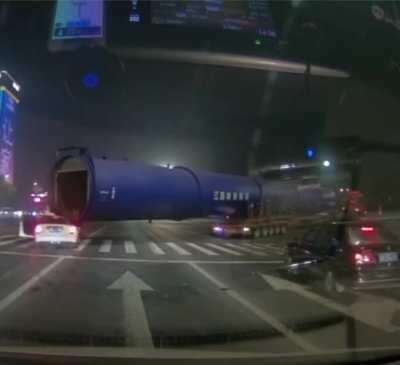 Truck crushes a car when making a turn