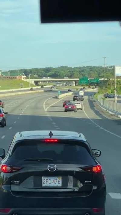 Drunk Bostonian on a car