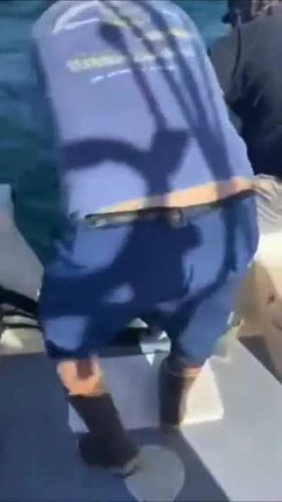 Fishermen rescue two girls who were swept out to sea