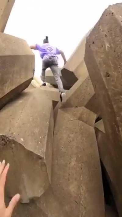 A breakwater made of dolos (dolosse plural), geometric shapes weighing up to 80 tonnes each, made of concrete. Cape town, South Africa. I broke my ankle just watching this