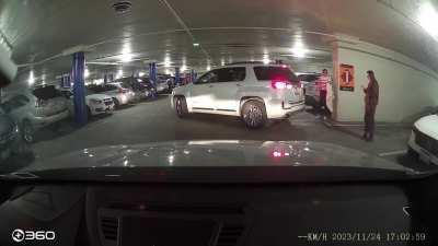 Main character standing in a parking spot, waiting for her friend and refusing to leave . (Recorded this today in San Jose. Parking was impossible to find near the mall because it’s Black Friday. The lady from the car before me got out and tried to argue.