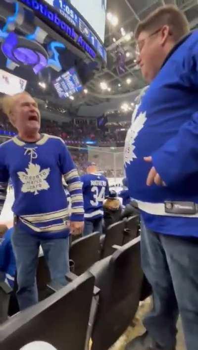 Idiot throws old man hat on the ice