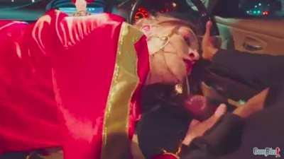 Petite British Harley Quinn cosplayer sucking a big black cock while driving in a car