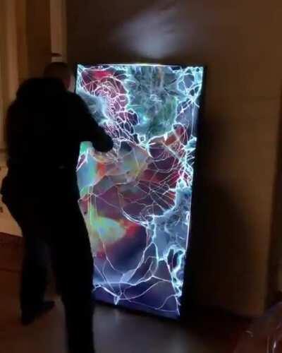 Beating the shit out of a TV makes for surprisingly trippy visuals