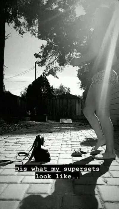 Bayley playing cornhole