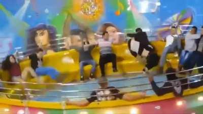 Girl loses pants on a carnival ride