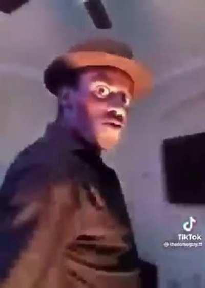 the man in the wall waiting for you to shake his hand