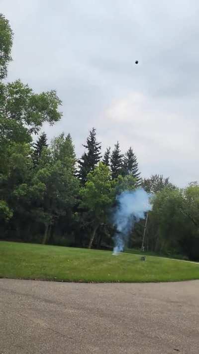 Firecracker underneath a cooking pot 