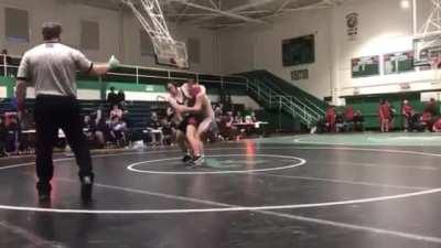 Father tackles son’s opponent after illegal move at high school wrestling match