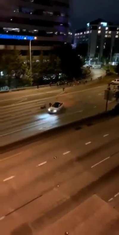 Two protestors hit by a car on a highway in Seattle