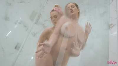 Blake Blossom has Savannah Bond with her tits pressed against shower door rubbing her pussy from behind