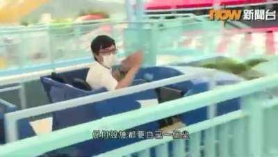Reporter on roller coaster