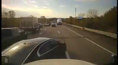 Idiot pushes car in front of him into path of semi, causes multiple car crash