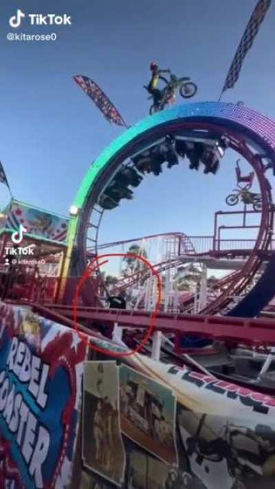 Grabbing your dropped phone from the rollercoaster track