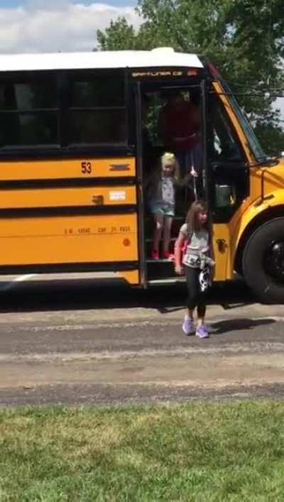 Little brother waiting to reunite with sister after first day at school