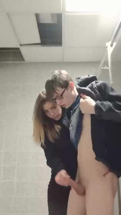 Cheerleader helping out the nerd