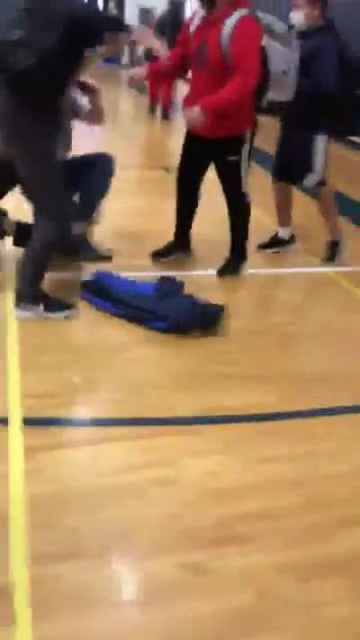 Racist kid (Gray) gets the shit beat out of him.