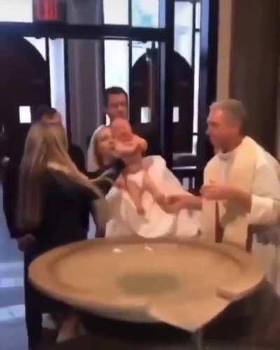 To dip a baby