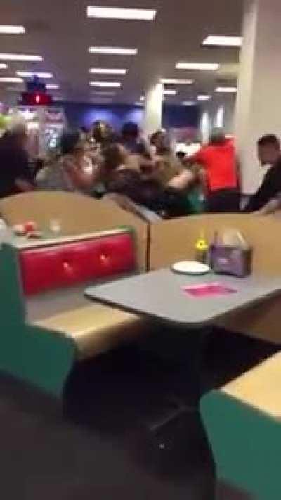 Public Throwdown between parents at a Chuck E. Cheese