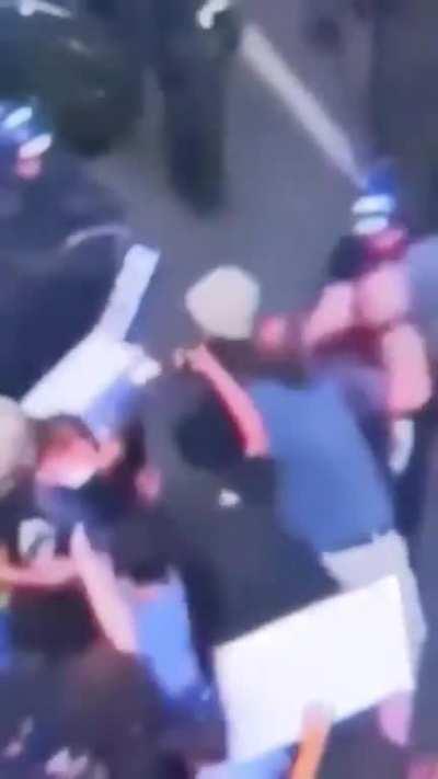 Police Hit Protester In The Head With Riot Shield. Massive Head Injury and Blunt Force