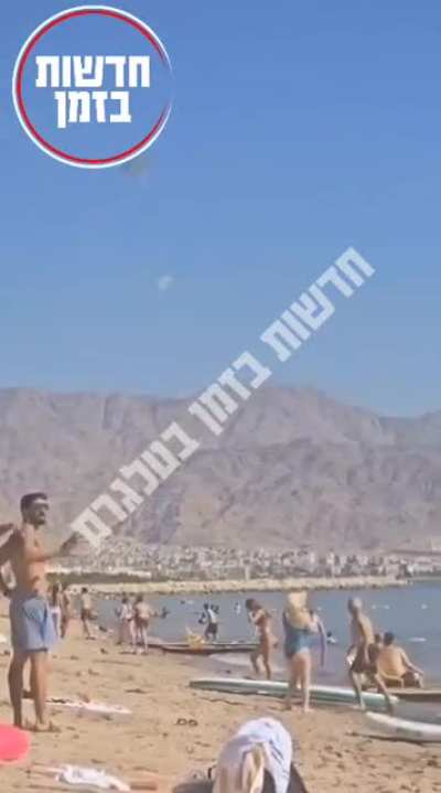 People cheering in Eilat after a Houthis drone was shot down by the Iron Dome above the beaches this afternoon [10.7/2025]