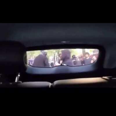 Man accidentally drives his car onto the wrong road in DT Portland today during the protest.