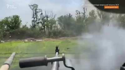 Ua pov Two RPG warheads are shot at a Ukrainian tank, the first one misses. Crewmember interview at the end included, he says all survived