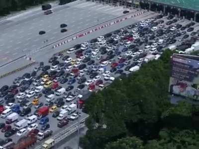 Serious question, why our police don't conduct checking on the toll booth? Why it has to be bottlenecked like this?
