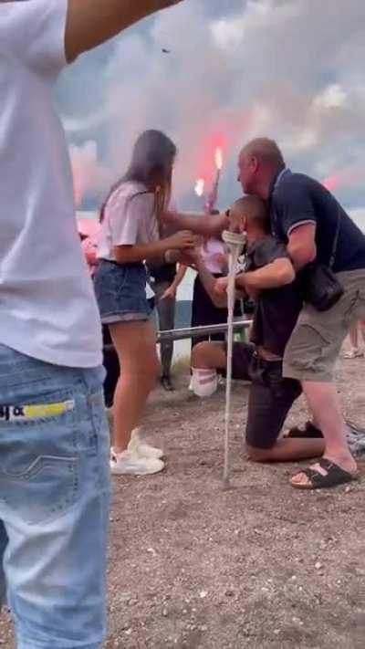 Roman lost his leg in the battlefield. He stood on one knee while his friend was holding him to propose to his girlfriend. Love makes us unbreakable.