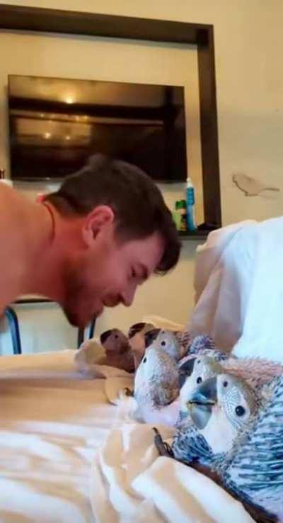 This man being an awesome bird dad