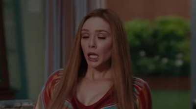 Elizabeth Olsen wearing her new vibrating panties at the dinner table