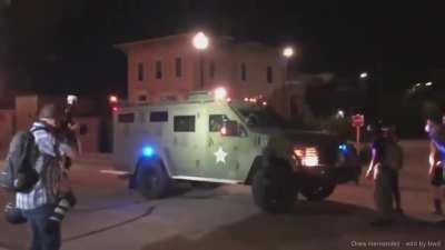 Armored vehicle deploys gas and armed man shoots as they drive away - Kenosha, Wisconsin 23rd August