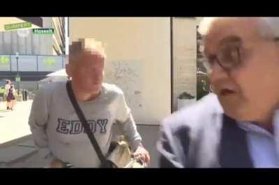 This man randomly rides into the mayor, who was giving an interview