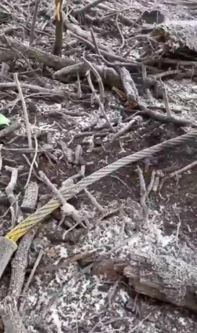 Donbass, a downed Russian T-80BVM tank that ran into an anti-tank mine during an unsuccessful attempt to storm Ukrainian positions, and a dead crew member