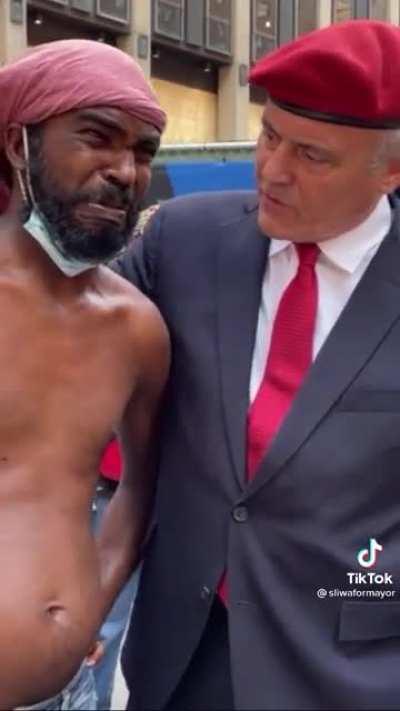 The moment a homeless man interrupts mayoral candidate Curtis Sliwa’s press conference.