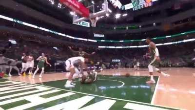 Suns forward Cam Johnson dunks over PJ Tucker in Game 3 of the NBA Finals