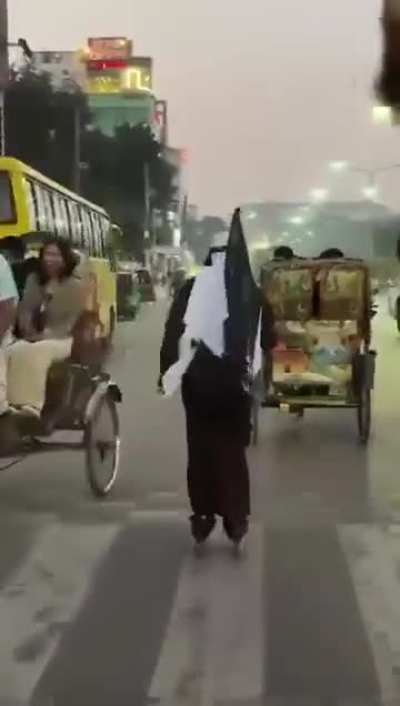 An individual displaying the al Qaeda flag was skating in Bangladesh