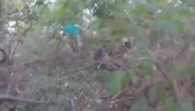 POV Ukrainian soldiers clearing Russian dugouts - Russian soldier hit by his own grenade - date/location unknown