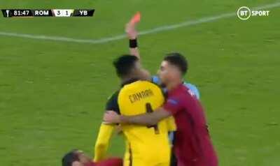 Henrikh Mkhitaryan is punched by Young Boys' Mohamed Ali Camara